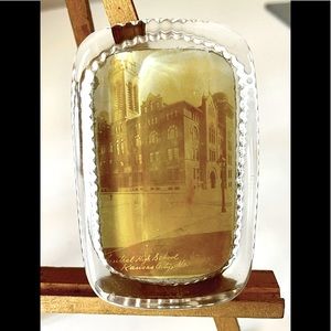 Paperweight made of glass. Antique Inside is a photo of central HS K C Missouri.